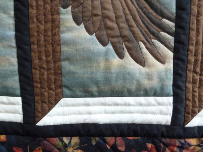 Quiltdetails Adler und Fenster